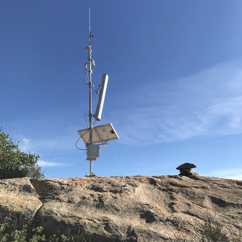 Big antenna with a long view on a mountain.